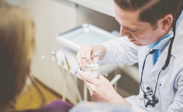 Dr. Nathan Brooks consulting a patient